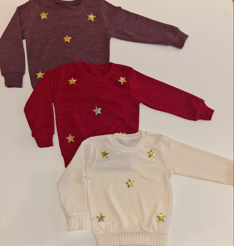 buzo nena lanilla con estrellas
